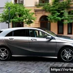 벤츠 A클래스의 도심 주행 효율성 - **Prompt:** A sleek, modern Mercedes-Benz A-Class hatchback, painted in a deep metallic grey, gracef...